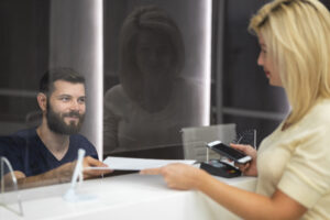 side-view-patient-talking-nurse-scaled-1-300x200